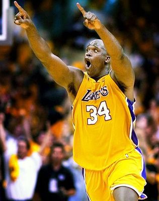 Shaq celebrating after alley oop from Kobe